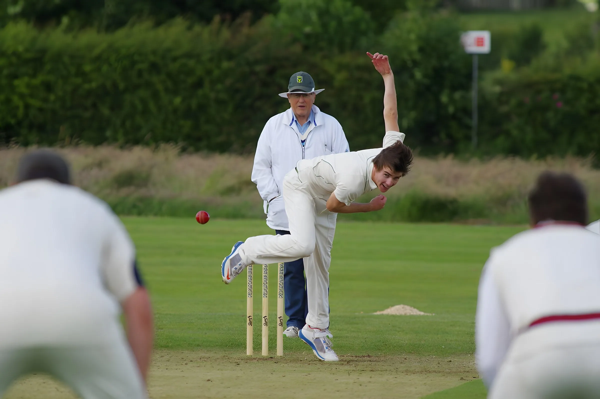 A bowler in a club cricket match
